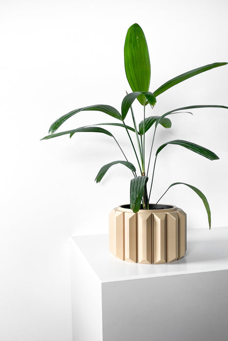 Decorative 3D printed planter featuring alternating concave and convex vertical grooves, symmetrical cylinder form with flat base