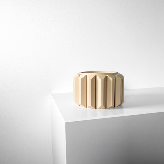 Side view of cylindrical planter with evenly spaced ribs around exterior and centered circular planting cavity