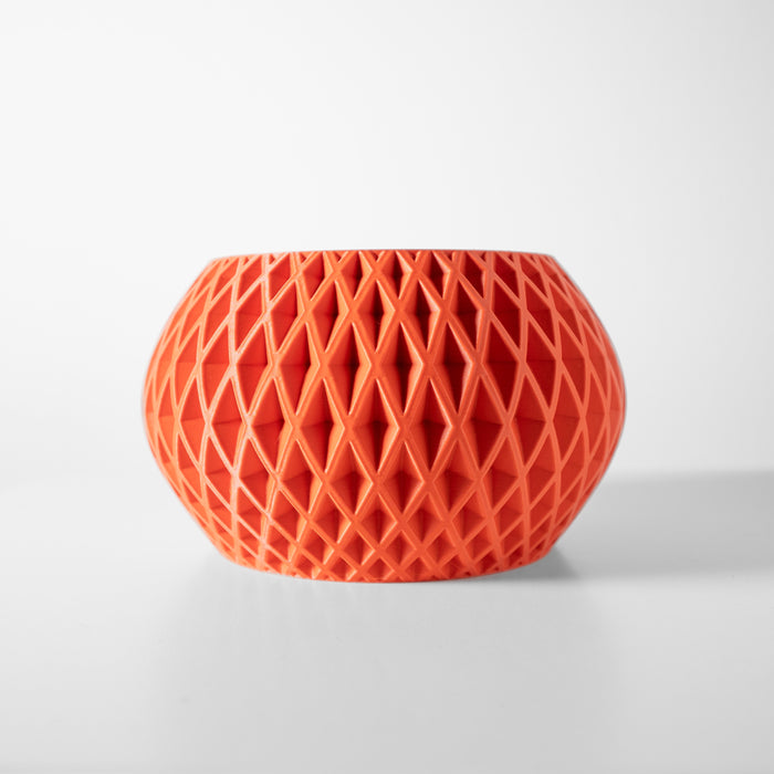 Side view of a 3D printed planter showcasing diamond lattice surface and bold shape