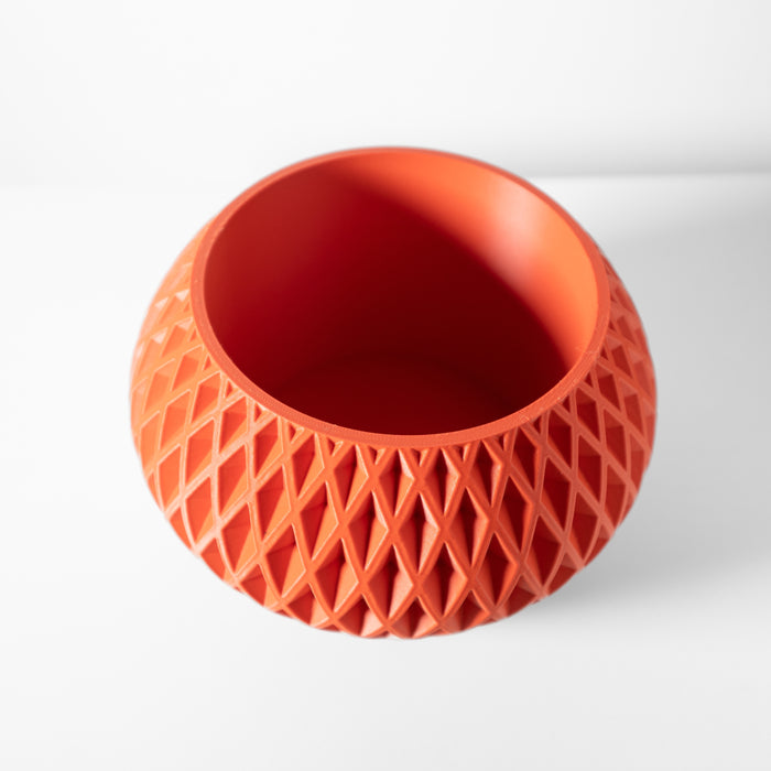 Top-down image of modern geometric planter with smooth rim and planting opening, 3D printed pot