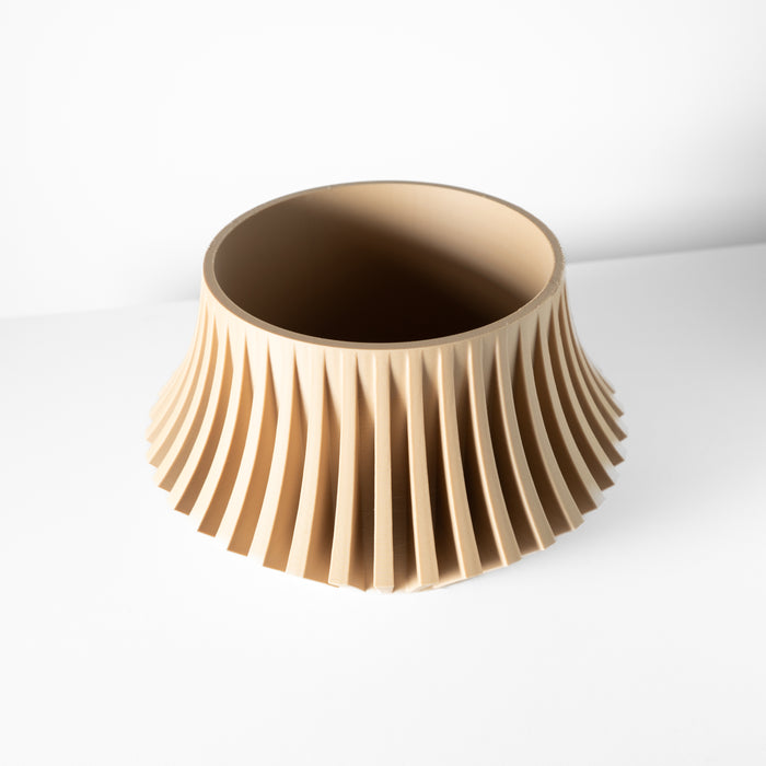 Top view of 3D printed wave-pattern beige pot with drainage hole | stylish modern planter for succulents | decorative flower pot with function and form
