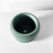 Top view of wide 3D printed flower pot with circular opening and layered ridges, ideal for modern plant lovers and futuristic home decor