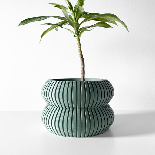 3D printed flower pot with soft bulbous shape and horizontal ridges, modern tabletop planter for succulents, designer plant pot with sculptural form