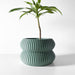 3D printed flower pot with soft bulbous shape and horizontal ridges, modern tabletop planter for succulents, designer plant pot with sculptural form