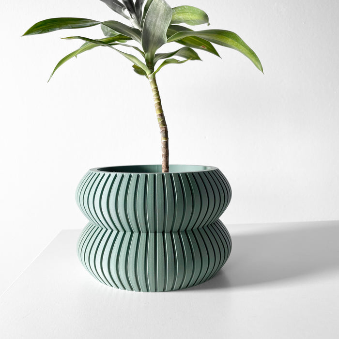 Stylish 3D printed planter pot with curved silhouette and ripple-like surface texture, geometric flower pot for indoor decor and small plants