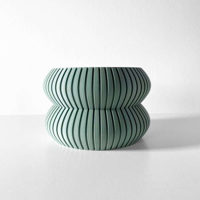 Rounded planter with smooth horizontal lines and wide midsection, decorative 3D printed pot for houseplants or herbs