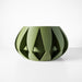 Symmetrical round pot with sculptural ribs and clean surface texture, made using layered 3D printing method