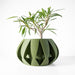 Modern 3D printed planter pot with symmetrical flared ridges, wide circular body, and deep top opening in futuristic green finish