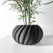 Elegant black matte planter with pleated organic shape, great for succulents, orchids, or desk greenery