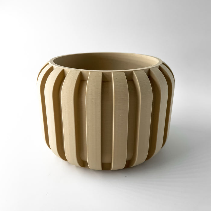 Compact decorative flower pot with vertical ridges, 3D printed beige planter for desk or shelf display