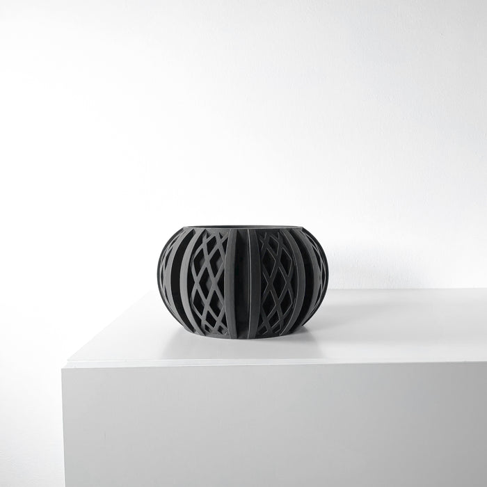 Sleek black planter with rhythmic pattern | unique 3D printed flower pot for shelves, desks or windowsills