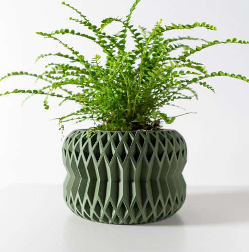 Modern 3D printed planter with scalloped wavy texture and wide top opening, artistic flower pot for stylish indoor plant lovers