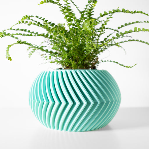 3D printed geometric planter pot with spiral ribbing and round organic silhouette, modern decorative flower pot for windowsill or tabletop