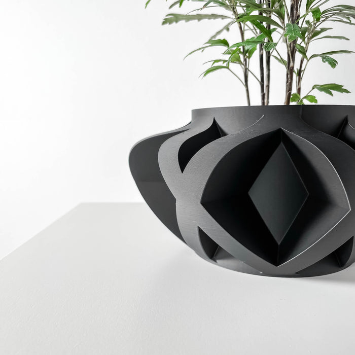 Designer planter with overlapping openwork structure, futuristic 3D printed flower pot for windowsill or shelf decor