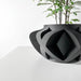 Designer planter with overlapping openwork structure, futuristic 3D printed flower pot for windowsill or shelf decor