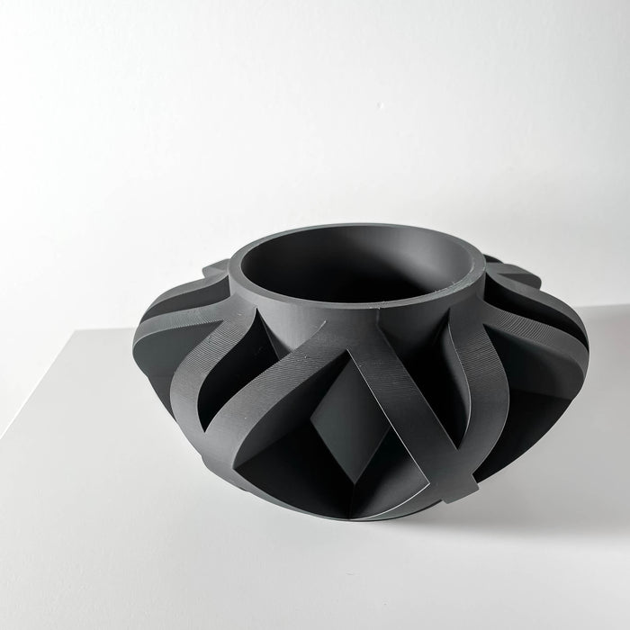 Modern geometric planter with circular inner cavity and dynamic outer form, artistic home decor for plant lovers