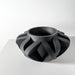 Modern geometric planter with circular inner cavity and dynamic outer form, artistic home decor for plant lovers