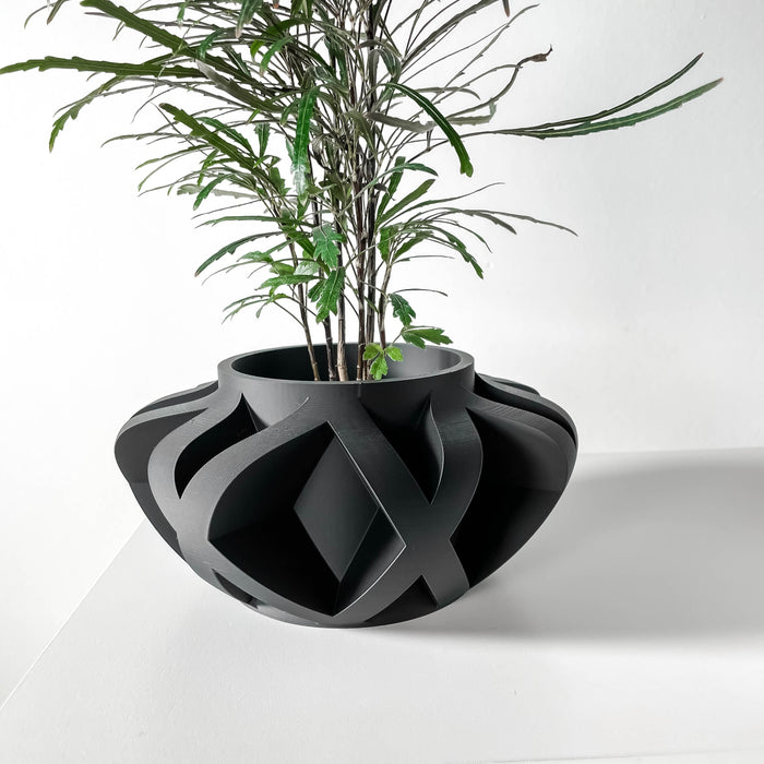 Artistic flower pot with flowing geometric curves and airy cutouts, stylish tabletop planter for contemporary home décor