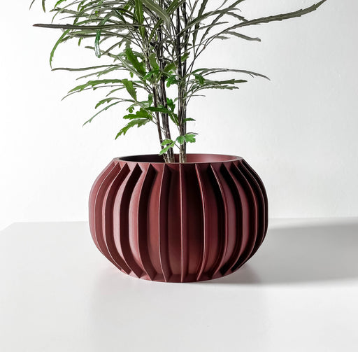 Modern 3D printed planter with deep vertical grooves and round silhouette, bold flower pot design for interior plant lovers