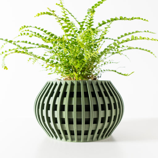 3D printed oval planter with vertical slot pattern and modern sculptural design, decorative flower pot for indoor plants and home decor