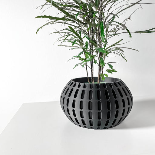 Cylindrical 3D printed planter with vertical cutouts creating a grid-like design, modern sculptural pot