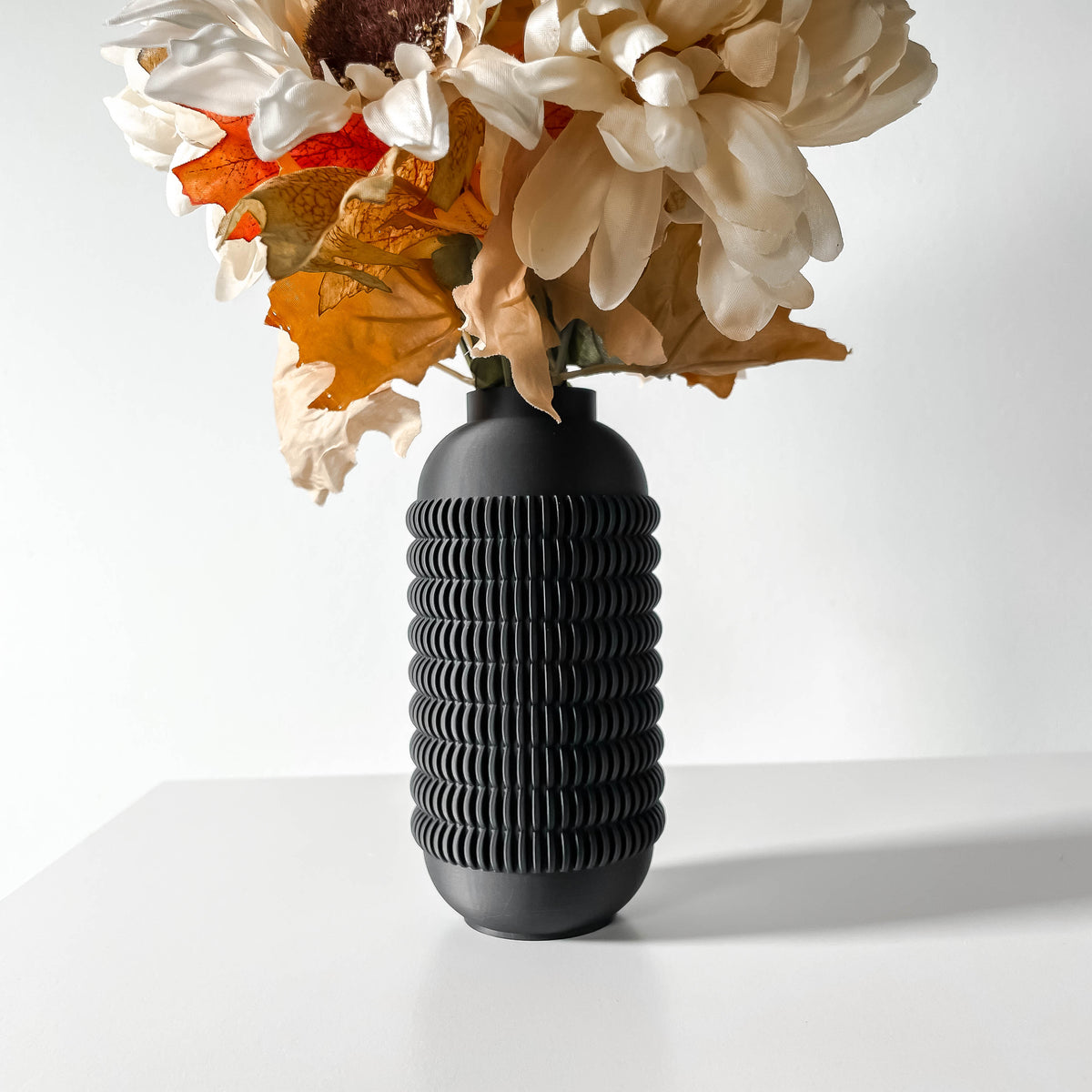 Juny black decorative vase with repeating loop texture