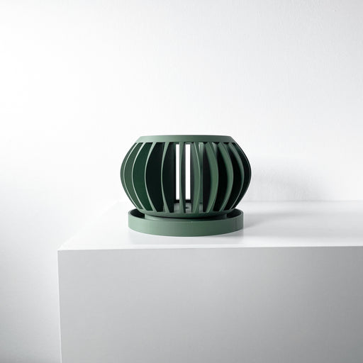Modern orchid planter in green with 3D printed sculptural curves, perfect for home office or indoor decor