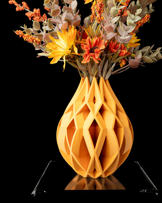 Von sculptural openwork vase with flowers, product view
