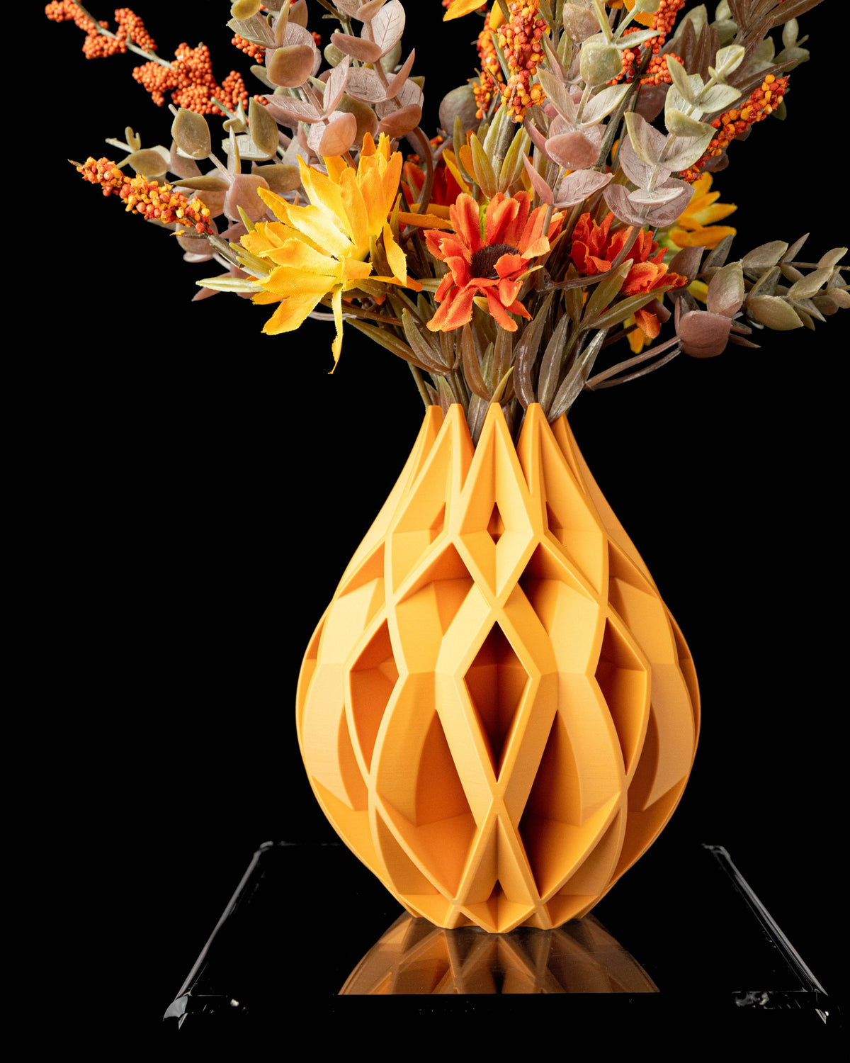Von sculptural openwork vase with flowers, product view
