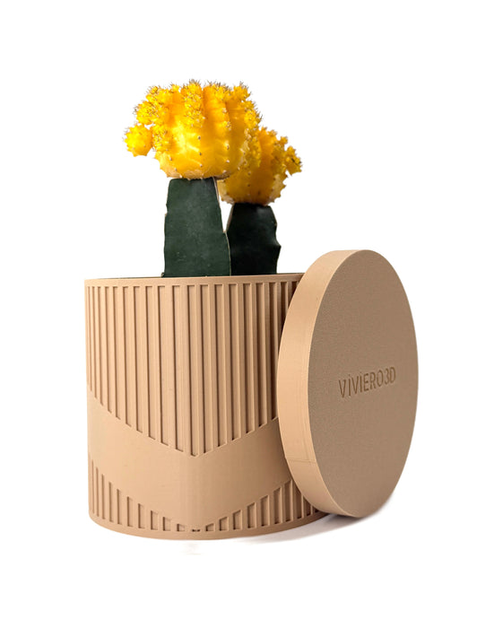 Minimalist spiral 3D printed flower pot featuring bright yellow cacti and a low planter profile. Its vertical ridge pattern and diagonal wrap make it one of the most unique planter pots for succulent arrangements. Ideal as a gift for mom or a decorative piece in modern indoor planters collections. Great addition to stylish book plant pot setups or for use as functional and beautiful flower pots.