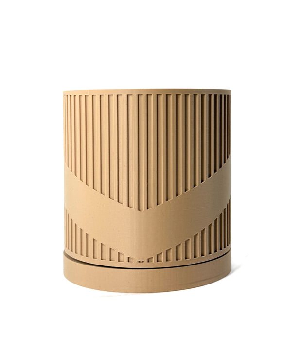 Empty view of the “Vortica” planter pot showcasing its elegant spiral texture and vertical grooves. This 3D printed planter pot is both decorative and functional, making it ideal for indoor planters and unique home decor. Great for succulent pots, flower pots, or as a low planter pot for desktops and bookshelves. A thoughtful gift for mom or stylish addition to any home environment.