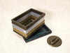 Angled view of the succulent wall planter "Orven" with planting area and mounting component