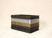 Side view of the book shaped planter "Orven" with embossed book spines and page textures
