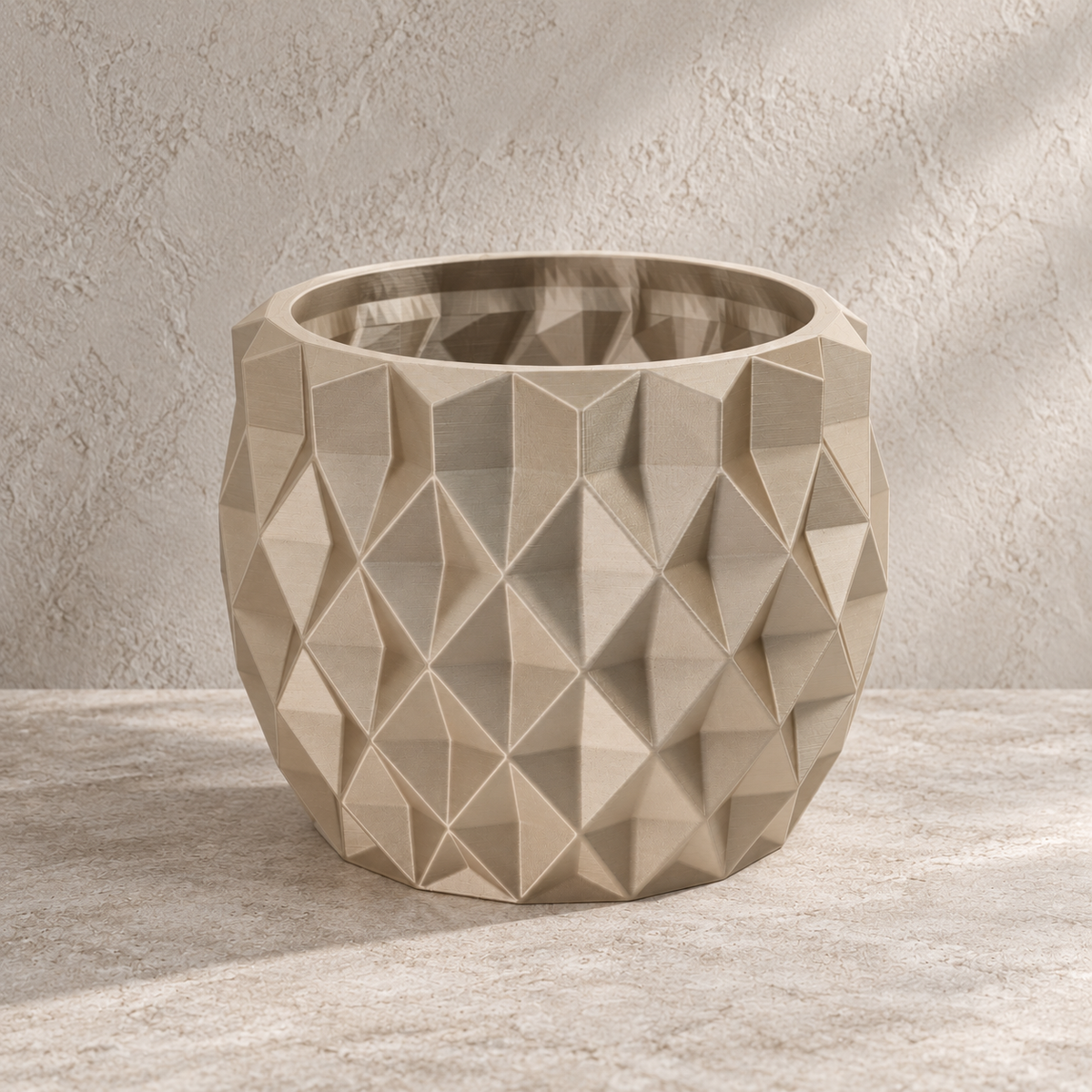 Prizma geometric wall planter showing faceted wall-mounted form across the design
