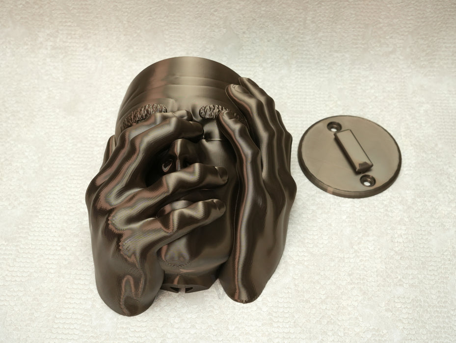 “Atlas” sculptural male face planter front view